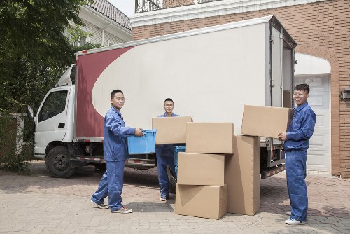 Packed moving boxes ready for removals in Camden flat