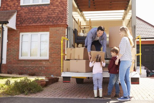 Local movers managing access and loading in Camden