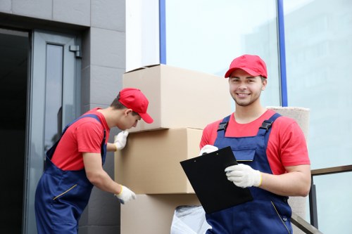 Packed boxes and wrapped household items ready for a Camden move