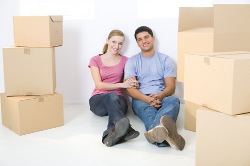 Local Camden moving team loading household furniture