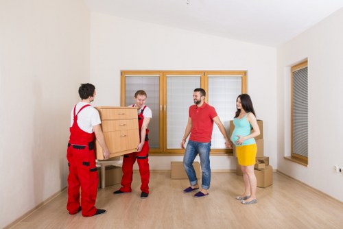 House movers loading furniture on a Camden street