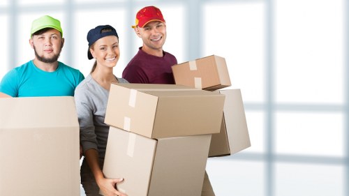Removal van loading for a Camden home move on a busy North London street