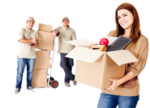 Packed moving boxes and furniture ready for a Camden relocation