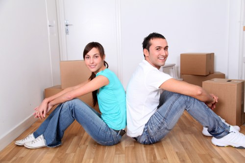 Commercial move in Camden with office furniture being loaded into a van