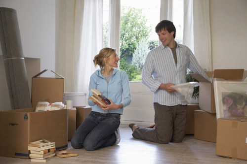 Packed boxes and furniture ready for transport in a Camden removal van