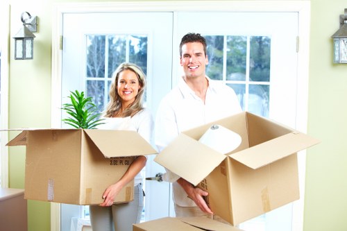 Preparing packed boxes and furniture for a Camden man and van service