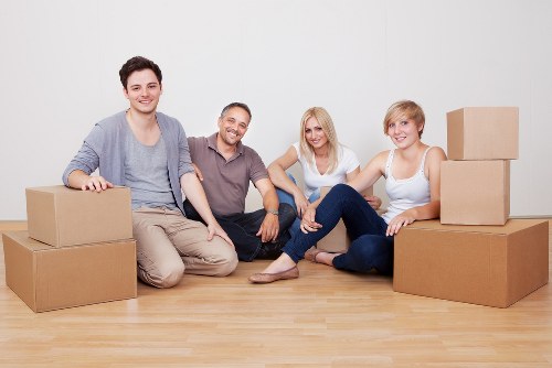 Business relocation service with boxes and desks in a Camden building